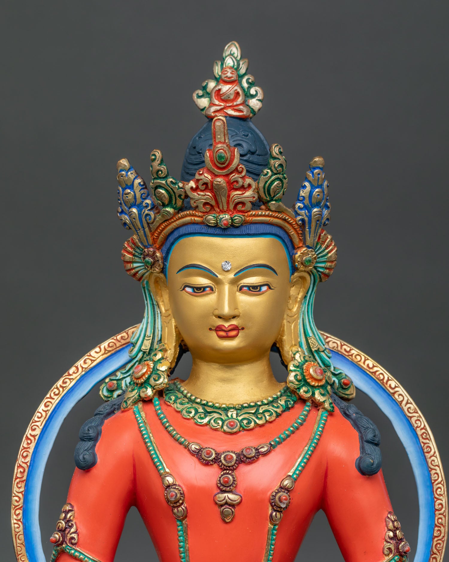 Close Up of Amitabha Buddha Gold Painted Face with Floral Robe Details