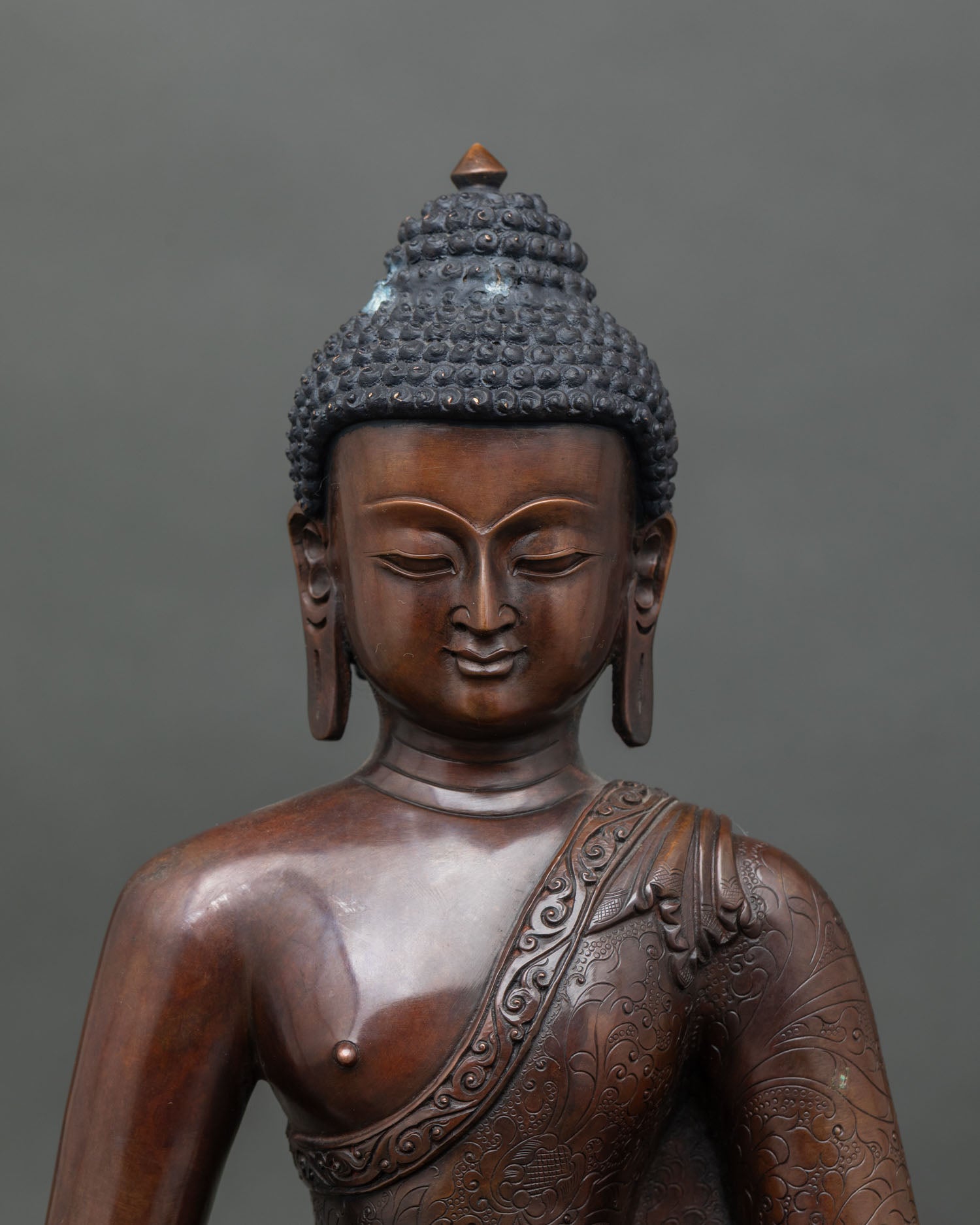 Close-up of Amitabha Buddha hands and lotus pedestal details