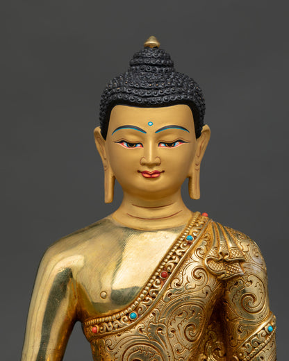 Close up of Amitabha Buddha statue showing the detailed floral motif monastic robe