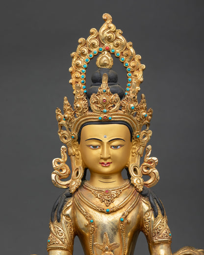 Close Up of Amitayus Copper Statue With Gold Finish and Sacred Details