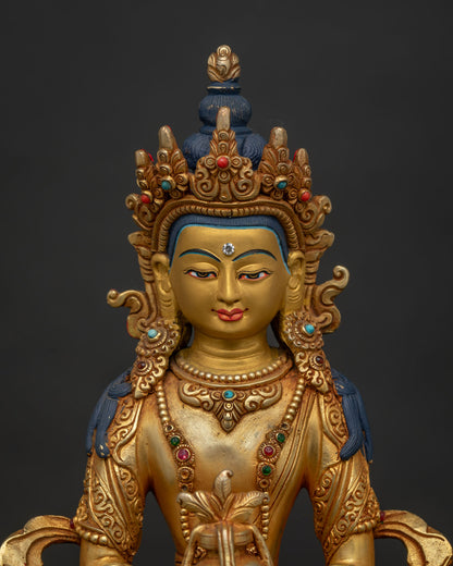 Close Up of Amitayus Gold Painted Face with Semi Precious Stones.