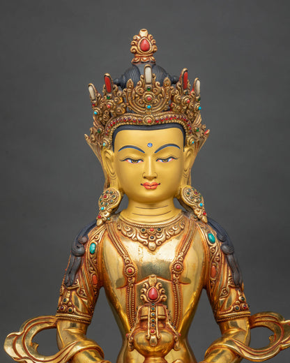 Close-up of Amitayus Statue featuring a serene gold-painted face, five-jewel crown, semi-precious gemstone inlays, and finely carved Buddhist ornaments.