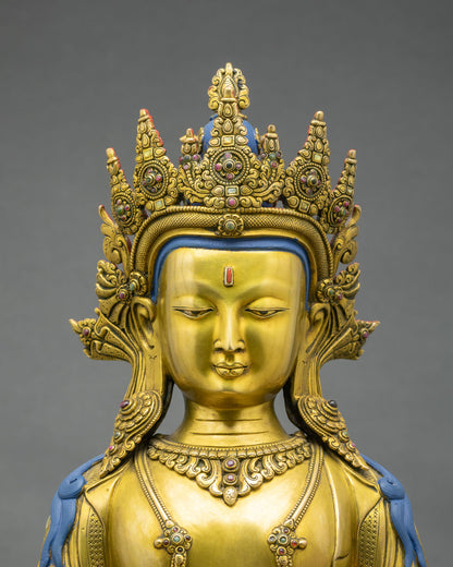 Close up of Amitayus statue showing fire gilded copper details, jeweled crown and amrita vase