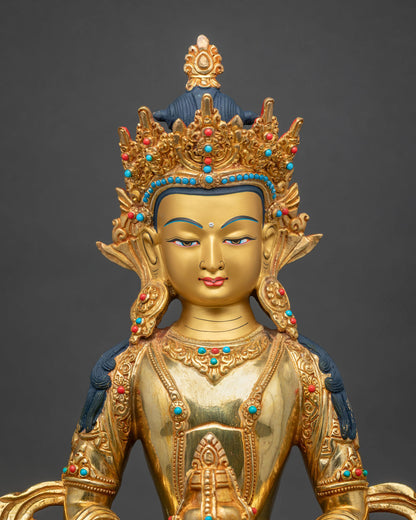 Close up of Amitayus statue with gold gilded crown and gemstone details, Nepalese Buddhist art