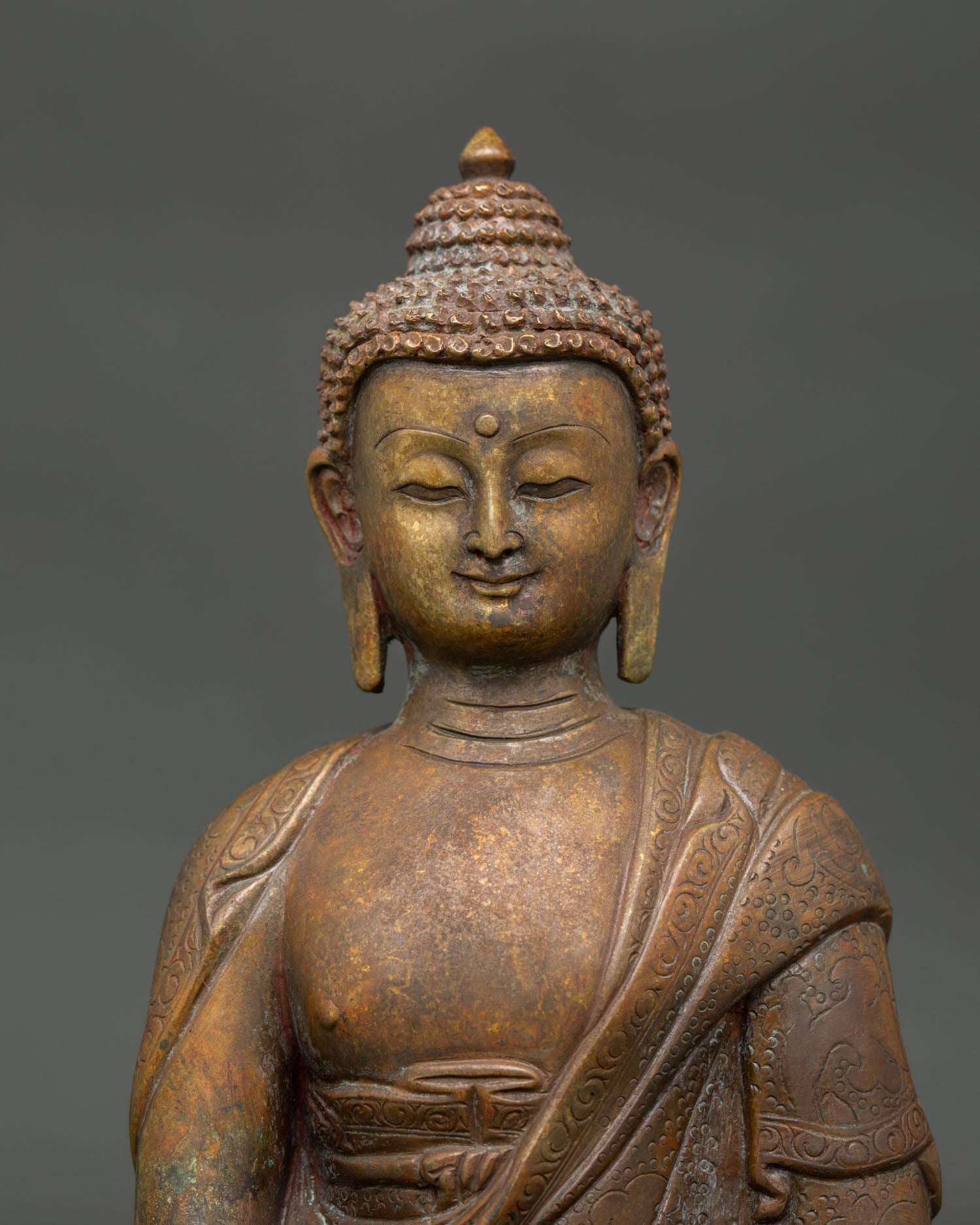 Close-up of Antique Finished Shakyamuni Buddha Statue showing handcrafted oxidized copper details