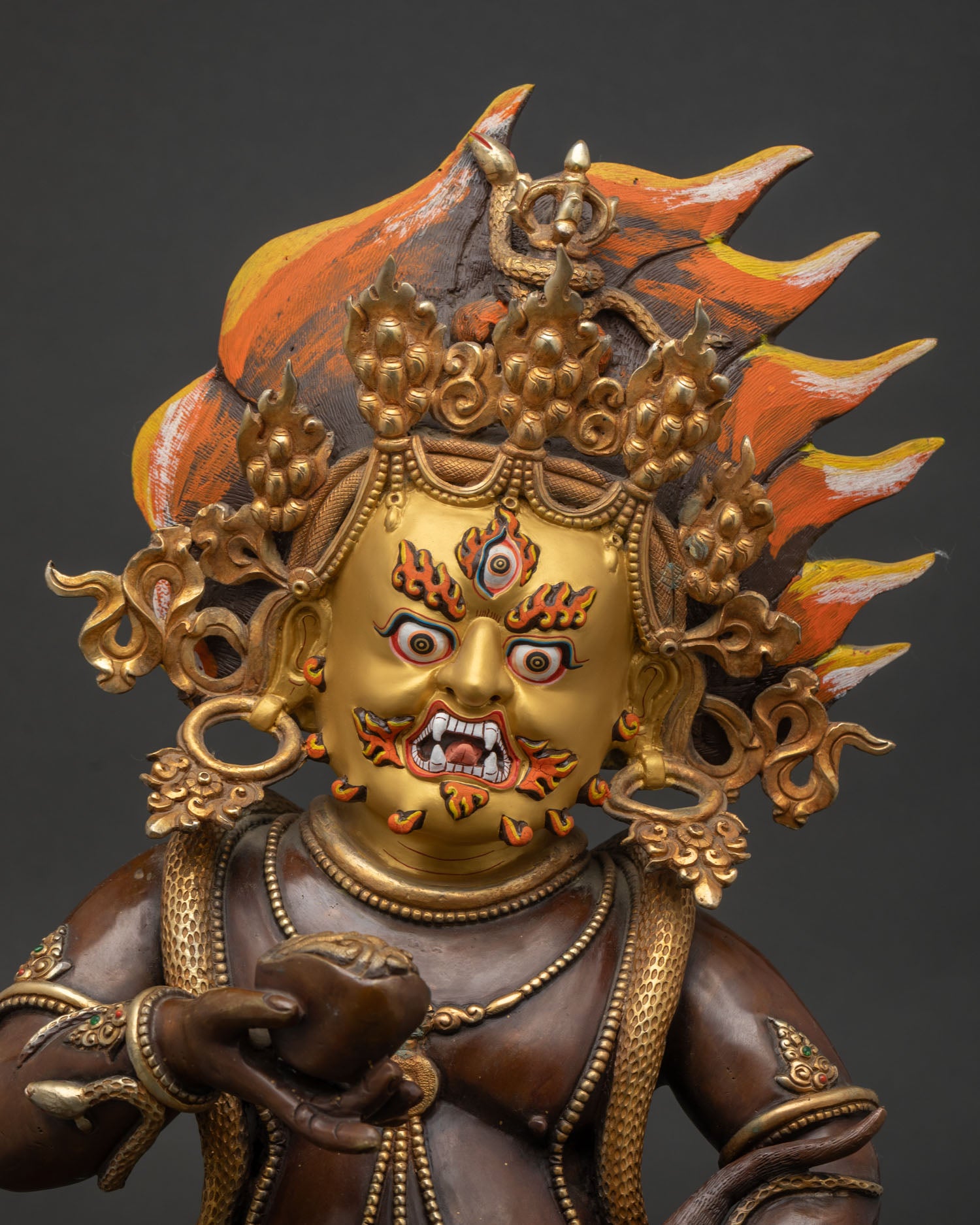 Close Up of Black Dzambhala Buddhist Statue with Kapala