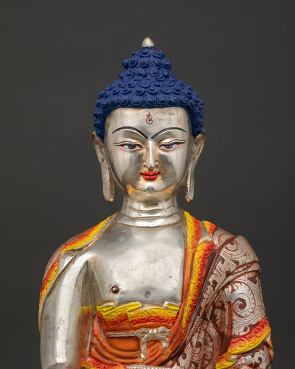 Close up of Buddha Shakyamuni statue, showing serene face expression and intricate Nepalese craftsmanship