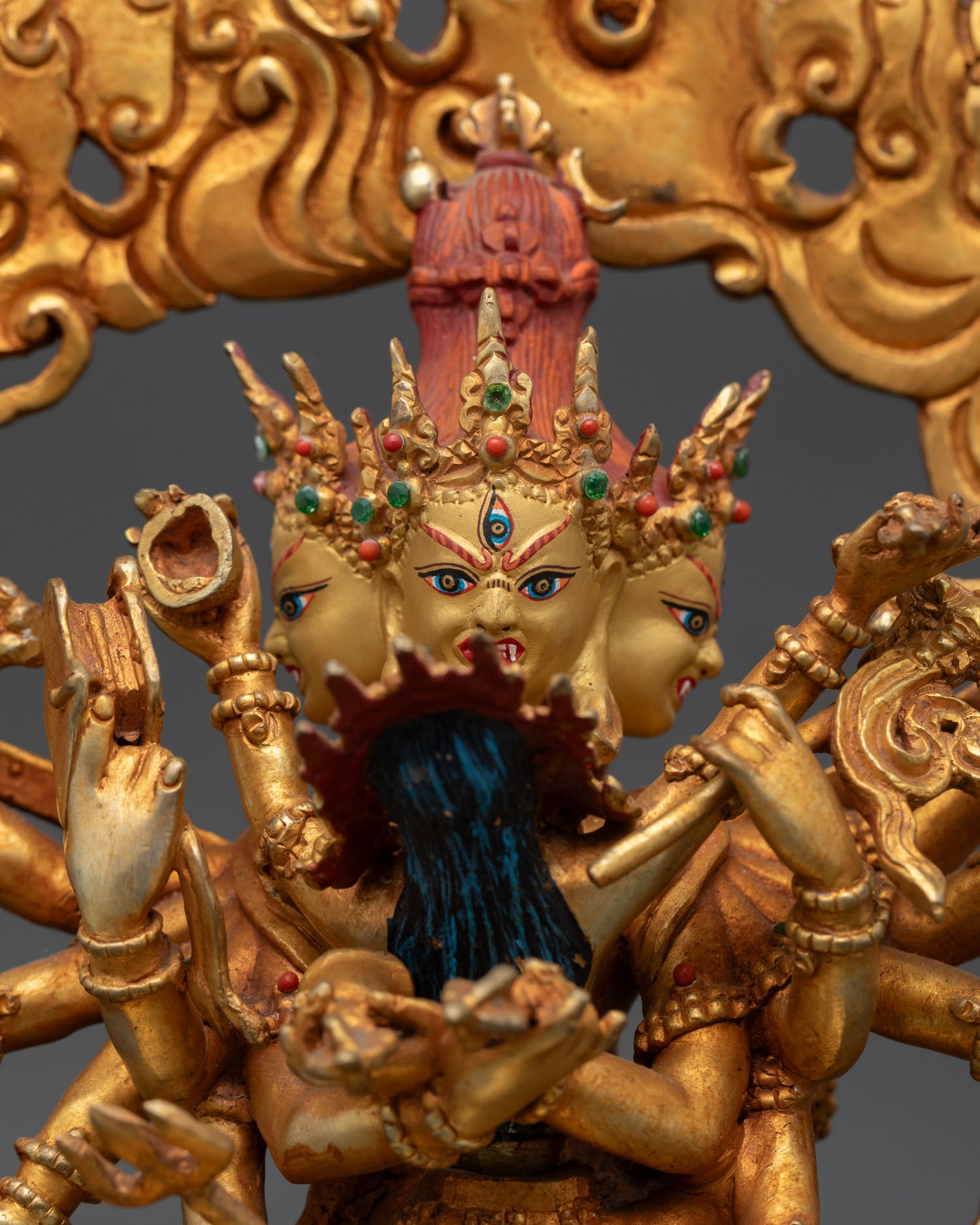 close up of chakrasamvara statue showing intricate copper carving and tantric ritual details