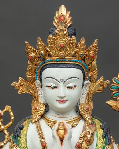 Close up of Chenrezig Bodhisattva hands in Anjali Mudra with lotus and mala