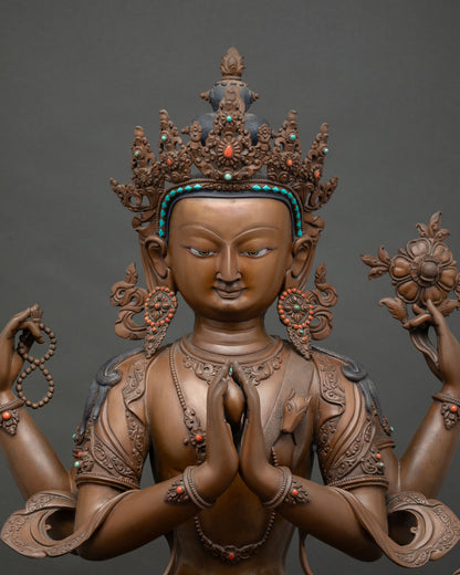 Close-up of Chenrezig's four hands showing anjali mudra, rosary, and lotus stem