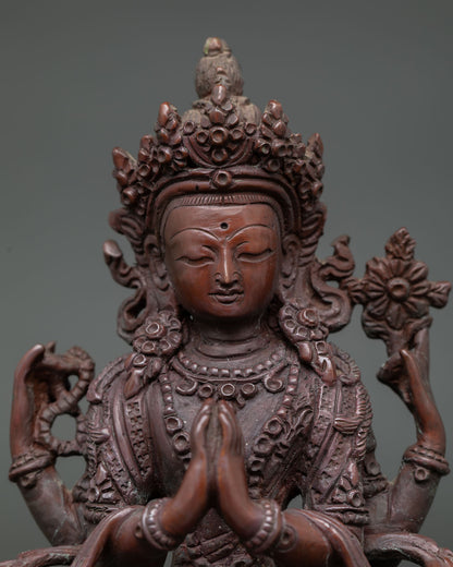Close Up of Chenrezig Holding Wish Fulfilling Jewel with Rosary Mala.