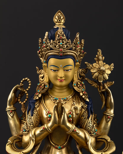 Close-up of Chenrezig Statue featuring ornate jewelry, semi-precious stone inlays, and detailed traditional Newari craftsmanship.