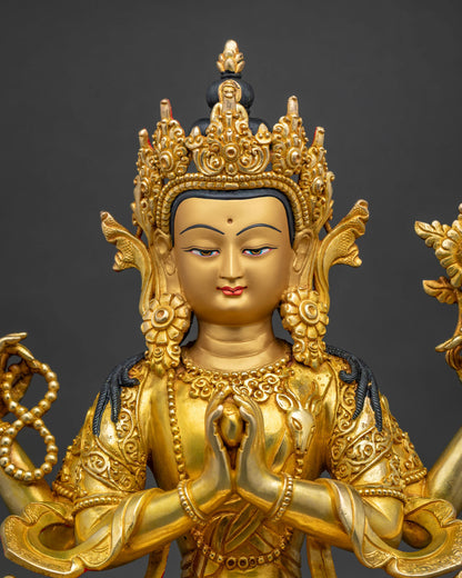 Close-up of Chenrezig statue showing gold gilding and crown detail