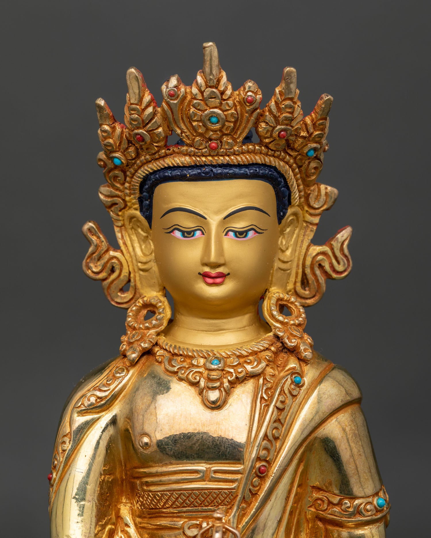 Close Up of Crown Mitrugpa Buddha Gold Painted Face Five Jewel Crown.