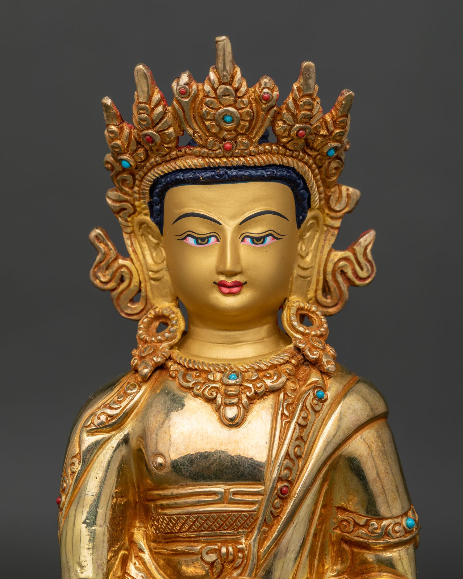Close Up of Crown Shakyamuni Buddha Gold Painted Face with Five Jewel Crown.