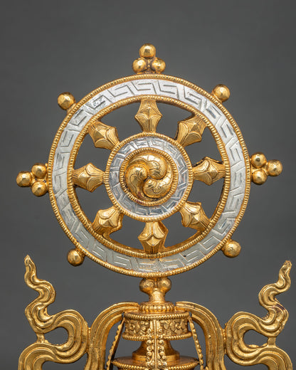 Close-up of Dharma Chakra showing eight spokes and intricate Nepalese craftsmanship