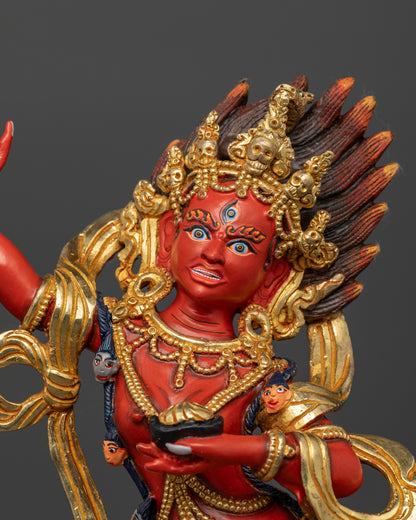 Close up of Dorje Phagmo showing fierce expression, skull cup, and curved ritual knife