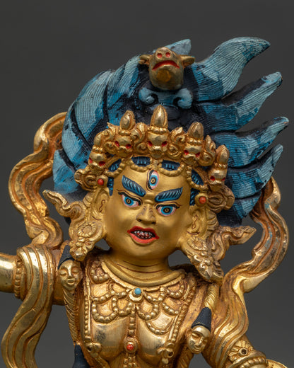 close up of Dorje Phagmo wrathful face blazing halo kartika and kapala hand-painted copper gold sculpture