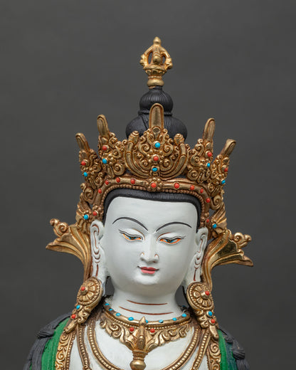 Close-up of Dorje Sempa's hands holding a vajra  and bell