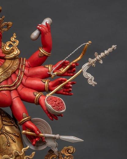 Close-Up of Elephant Deity's Left Arms with Hand-Carved Ritual Objects