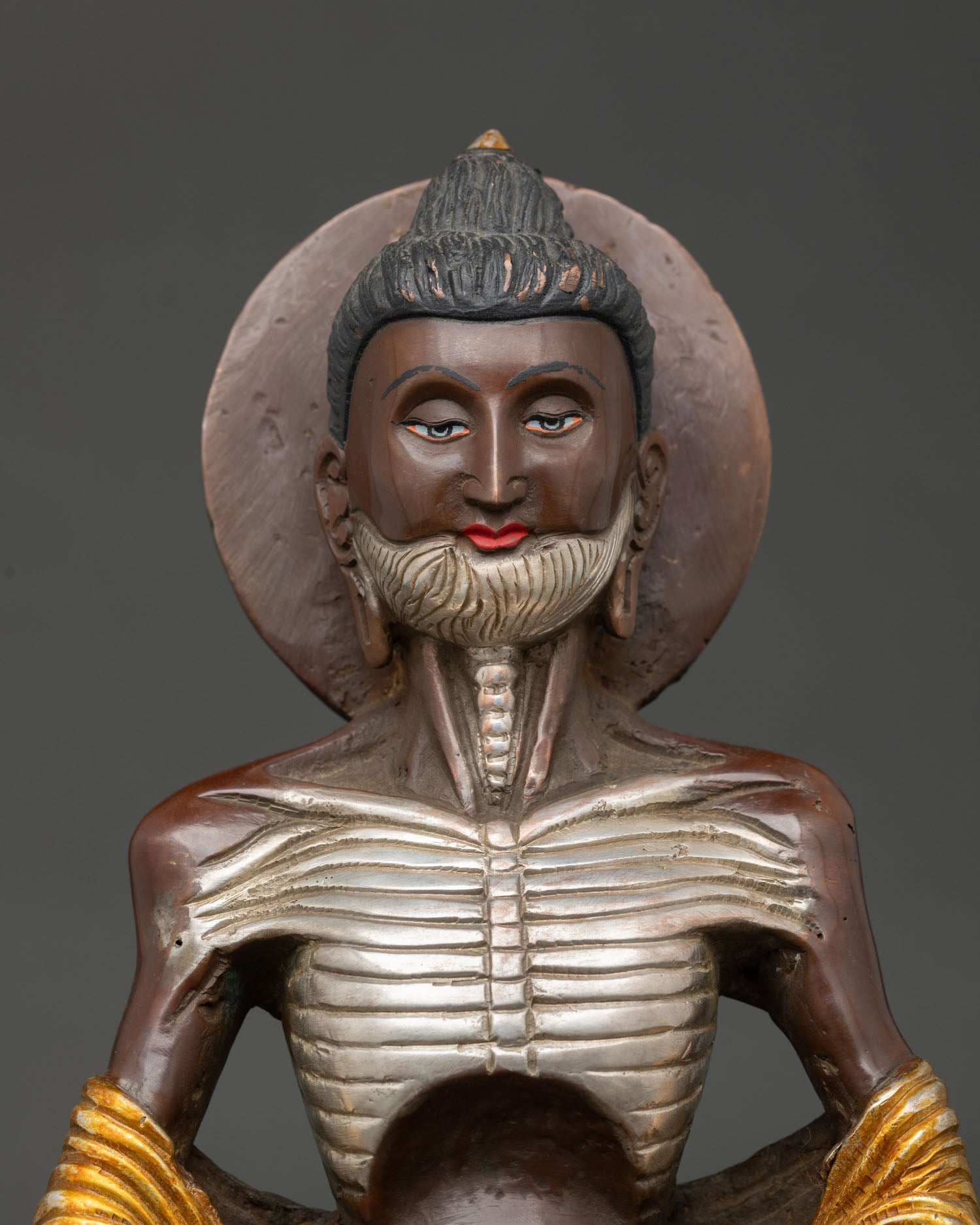 Close up of Fasting Buddha Statue showing intricate Himalayan craftsmanship