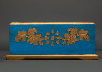 Close up of floral details on hand painted Tibetan wooden tissue box