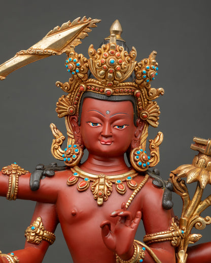 Close-up of Four-Armed Maha Manjushri face, gold gilded crown detail