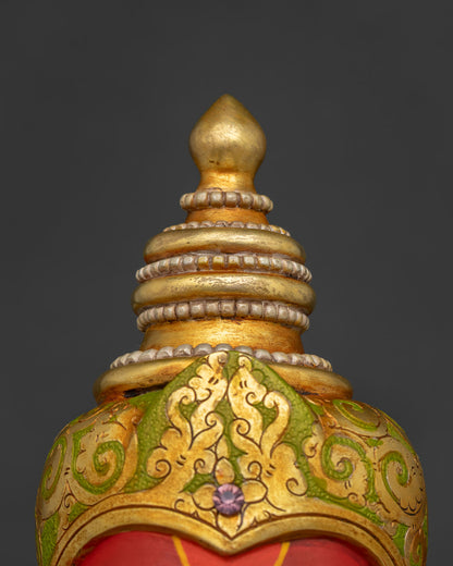 Close-up of Ganesha statue tiered gold Mukut crown, Nepal Newari craftsmanship
