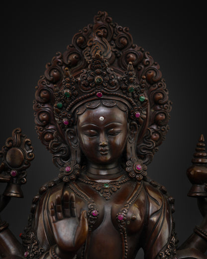 Close-up of Goddess Lakshmi with a serene expression, jewel inlays, intricate crown, and traditional Newari craftsmanship
