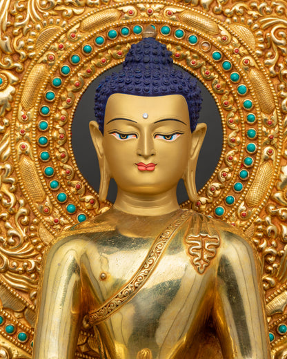 Close-up of gold Shakyamuni Buddha statue, fire-gilded copper, lotus seat, intricate robe detailing Nepal
