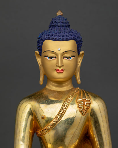 Close-up of gold Shakyamuni Buddha statue, fire-gilded copper, lotus seat, intricate robe detailing Nepal