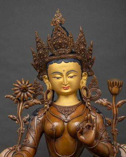 Close-up of Green Tara statue, oxidized copper body, serene expression, Newari craftsmanship