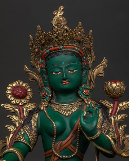Close Up of Green Tara Statue with Semi Precious Stones and Gold Gilded Face Details.