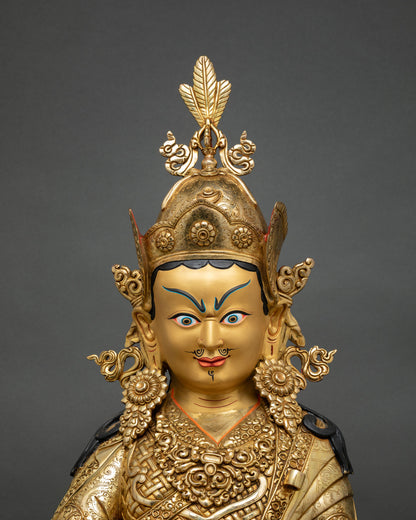 close up of guru rinpoche statue showing lost wax craftsmanship, detailed vajra and skull cup, nepalese buddhist art