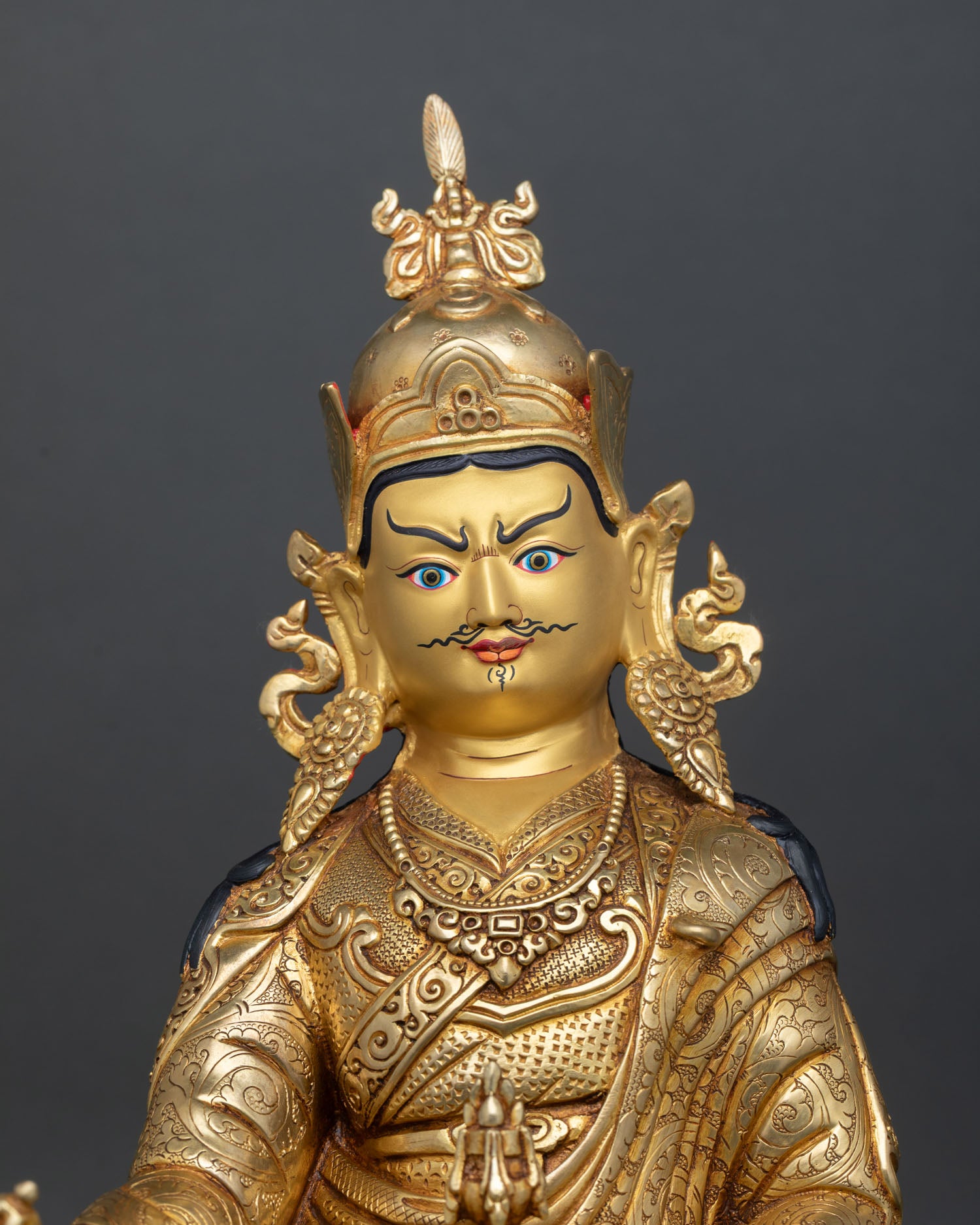 Close-up of Guru Rinpoche Statue with intricate gold fire gilding and handcrafted details