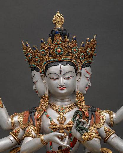 close up of handcrafted namgyalma statue with acrylic painted finish and jeweled ornaments