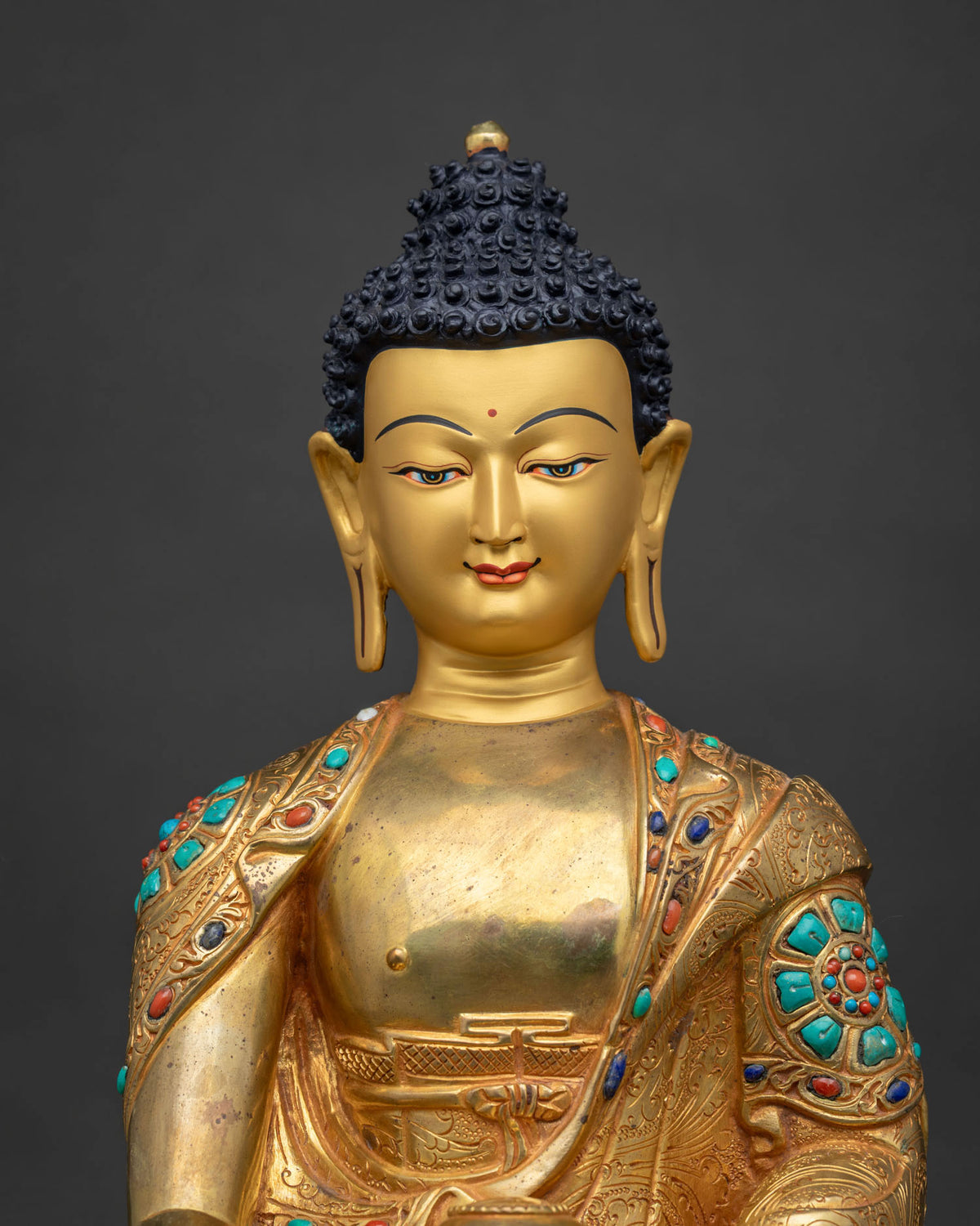 Close-up of handcrafted Shakyamuni Buddha statue, 24K gold fire-gilded copper details