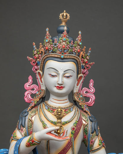 close up of handcrafted vajrasattva statue with intricate gold gilded ornaments