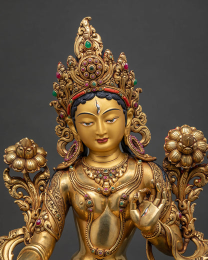 Close up of handcrafted White Tara Statue showing gold fire-gilded copper detailing