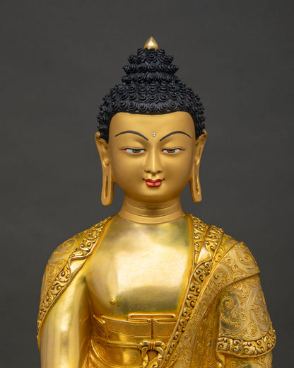 Close-up of handmade copper Shakyamuni Buddha statue Myanmar, fire-gilded gold details