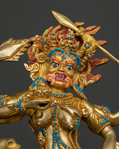 Close up of handmade Palden Lhamo Statue with gold fire gilding and turquoise ornaments