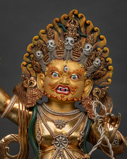 Close-up of handmade Vajrapani statue, gold-gilded copper Nepalese Buddhist idol