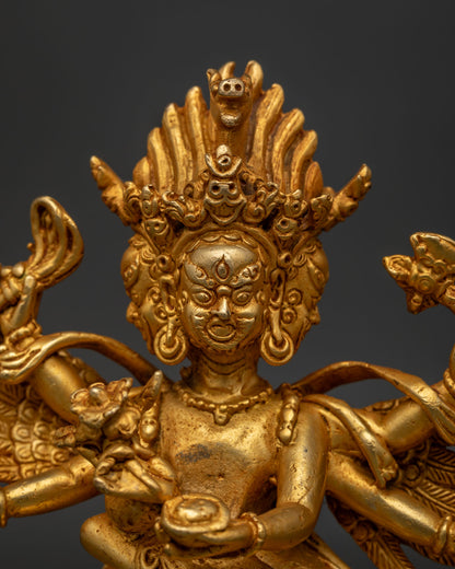 Close Up of Hayagriva Statue with Fierce Faces and Intricate Gold Details.
