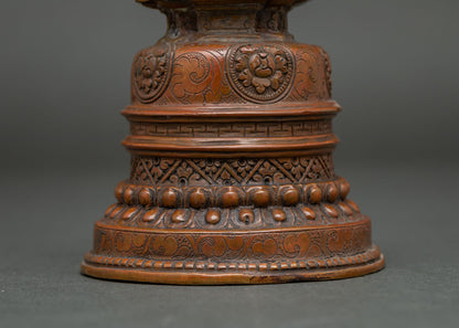 Close up of Kadampa Stupa with double lotus pedestal and intricate floral carvings