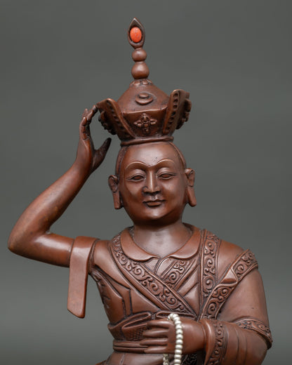 Close Up of Karmapa Oxidized Copper Statue with Hand Carved Royal Garments.