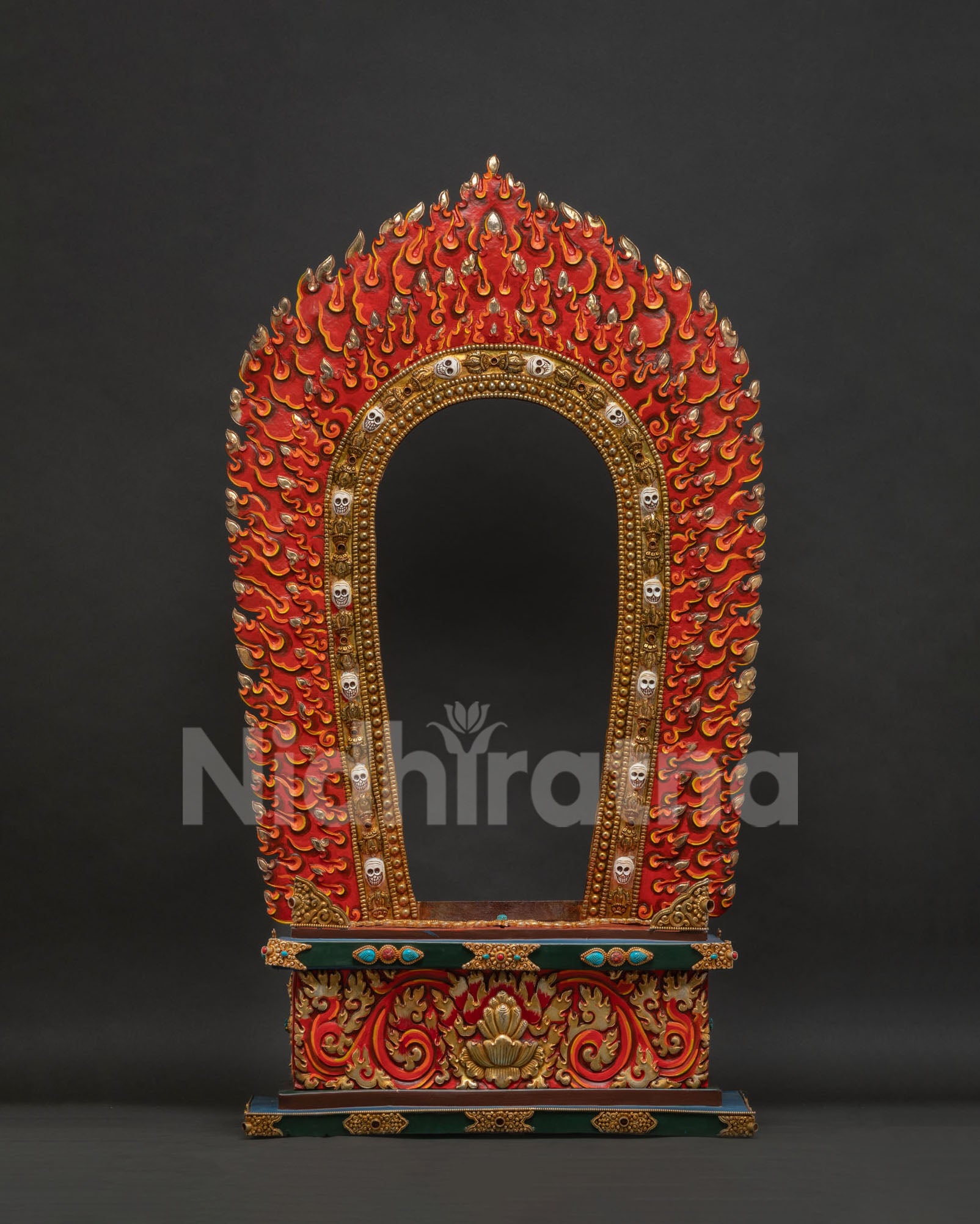 Close up of Kurukulla Statue's blazing halo and throne, carved with double vajra and norbu jewel