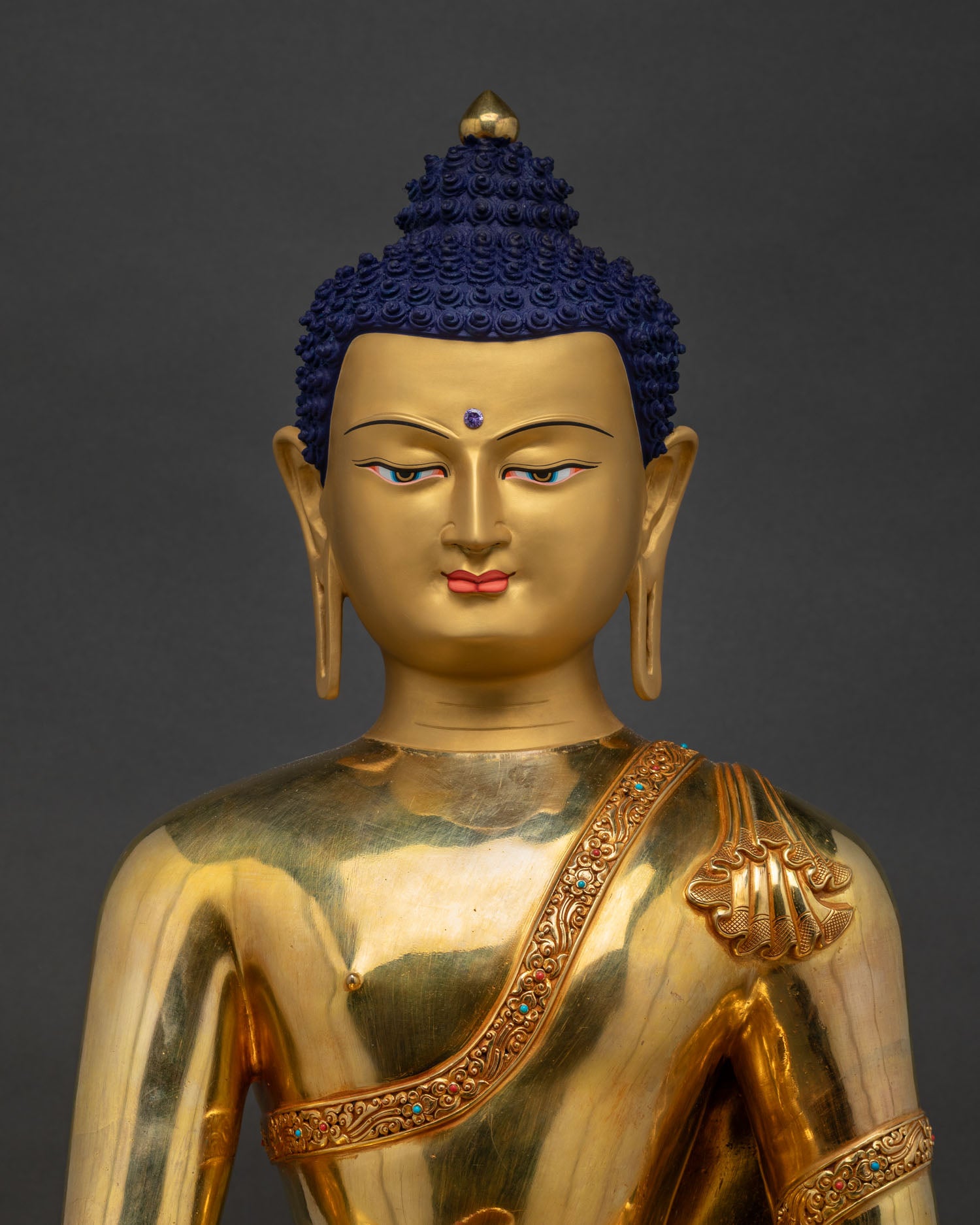 Close-up of Large Shakyamuni Buddha Statue showing gold-gilded copper craftsmanship