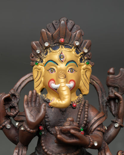 Close Up of Lord Ganesh Statue with Semi Precious Gemstone Adornments.