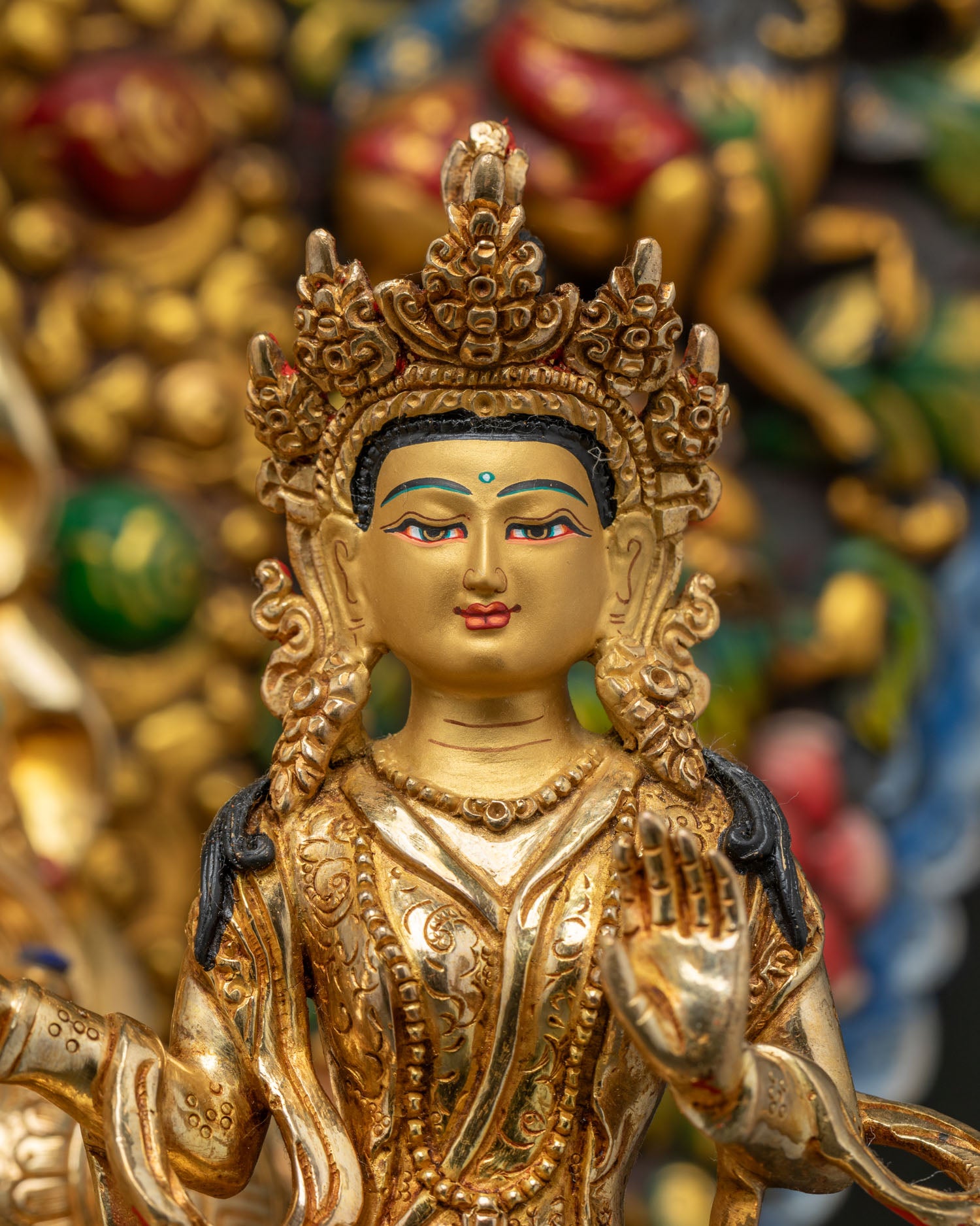 Close-up of Mandarava consort figure on Guru Rinpoche throne statue
