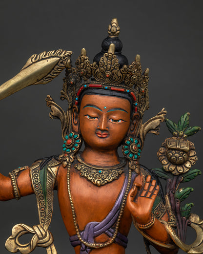 Close Up of Manjushri Statue with Prajnaparamita Scripture and Gold Gilded Details.